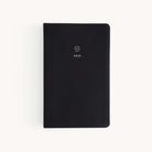 2025 Calendar Year Daily Dapperdesk Planner by Emily Ley featuring the Black Tie leatherette cover with gold foil details.