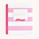 The Big Kid Book - Raspberry by Simplified features a pink and white striped cover with a gold-bordered square displaying the title. A red ribbon reads Growing & Growing, inviting young readers to explore its vibrant pages, ideal for a childs adventure.