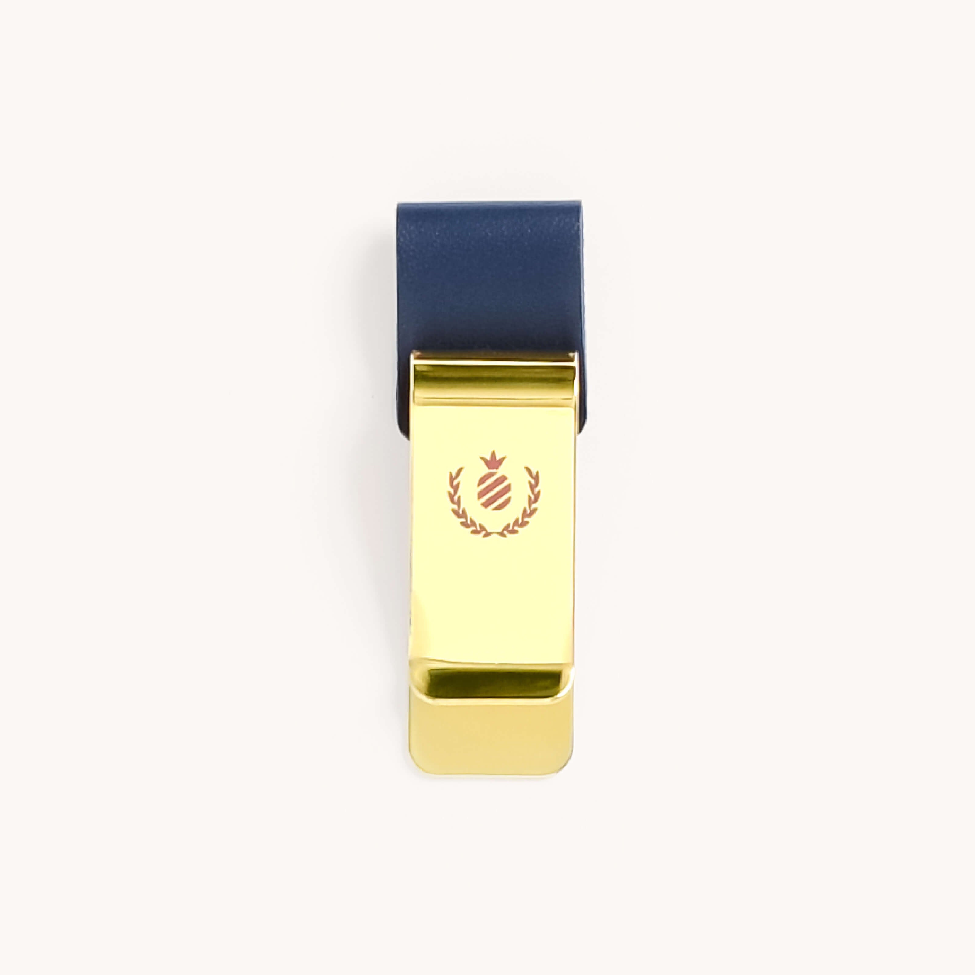 Simplified by Emily Ley | Pen Clip in Navy featuring a brass metal clip with a navy leatherette band.