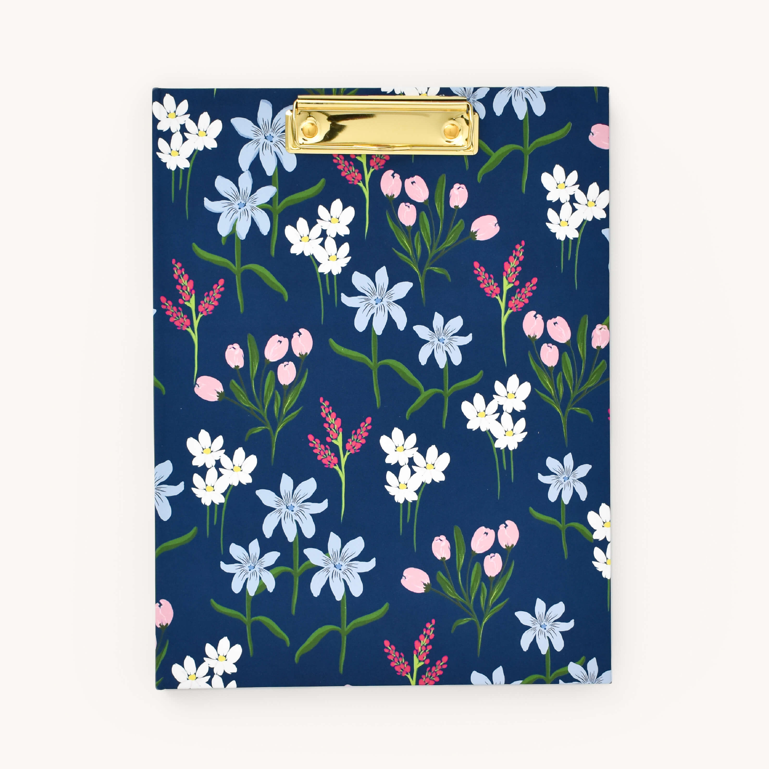 The Simplified Clipfolio - Navy Wildflowers features a navy background with white, pink, and light blue flowers with green stems. A chic gold clip at the top keeps your documents organized while adding floral elegance to your workspace.