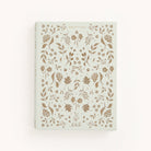 Introducing Simplifieds Linen Journal - Gratitude, featuring a white cover with Gratitude at the top center. This elegant linen hardcover showcases an intricate gold floral and leaf design, perfect for daily reflections.