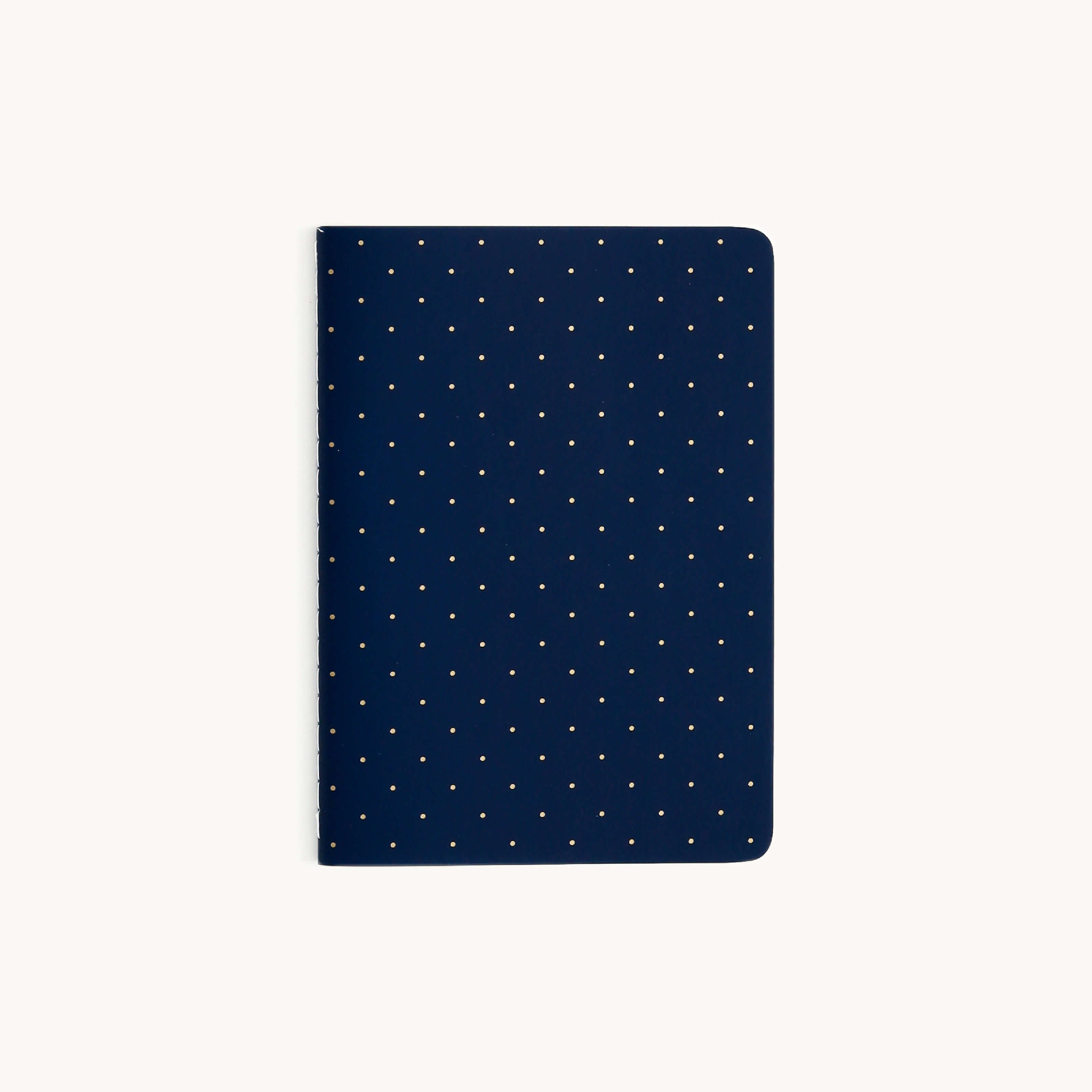 Simplifieds Mini Notebook - Dainty Dot features a blue cover with custom small white dots on a light background.