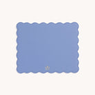 The Simplified Scalloped Mousepad is a rectangular leatherette pad in light blue with scalloped edges and a small gold emblem near the bottom, making it a stylish desk accessory.