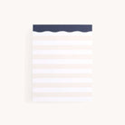 The Simplified Notepad in Cream Stripes has a soothing light gray and white pattern with a dark blue wavy edge, perfect for effortlessly organizing your thoughts.