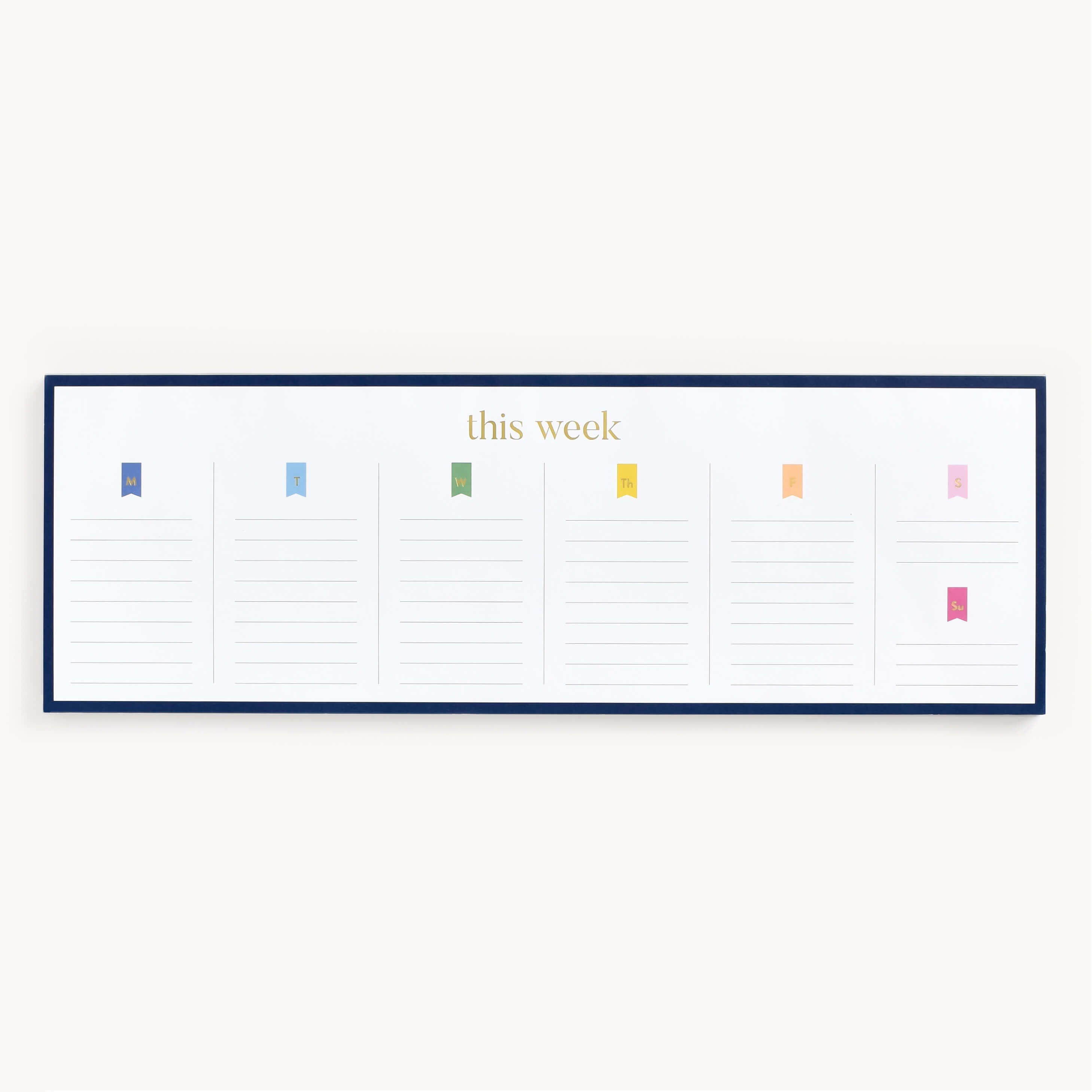 The Simplified Notepad - Weekly Planning features a minimalist design with sections for seven days, each topped with a colored flag. This week is printed at the top center, encased in a black border. Perfect for jotting down reminders and planning grocery lists.