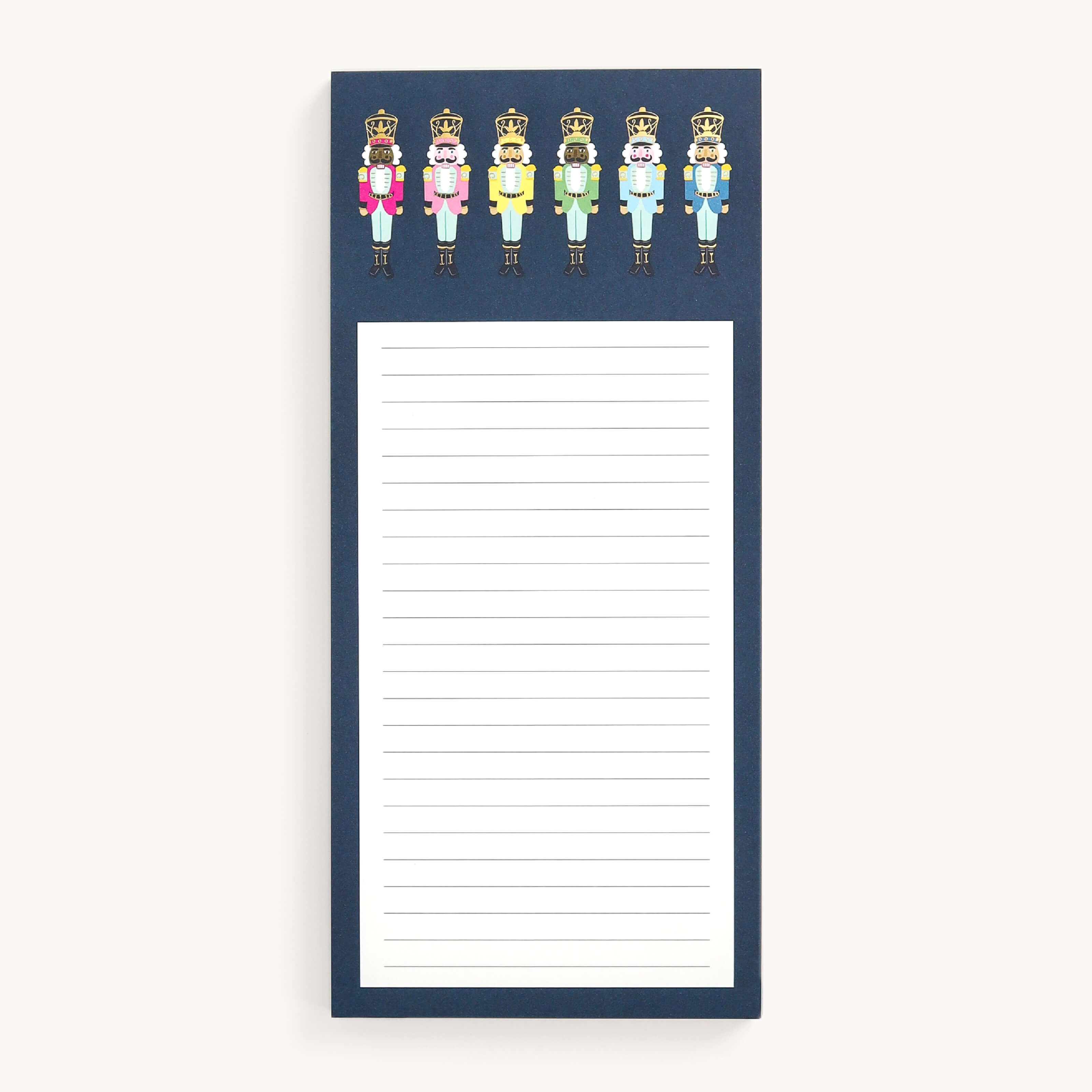 The Tall Notepad - Nutcrackers by Simplified features a navy blue border and a lively row of Happy Stripe Nutcrackers dressed in vibrant pink, orange, green, light blue, and blue.