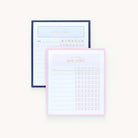 The Sticky Note Set - Routines by Simplified features two planner notepads with navy and pink borders on a white background, ideal for grocery lists or reminders. Each notepad includes sections for tasks and days of the week with grid spaces for tracking.