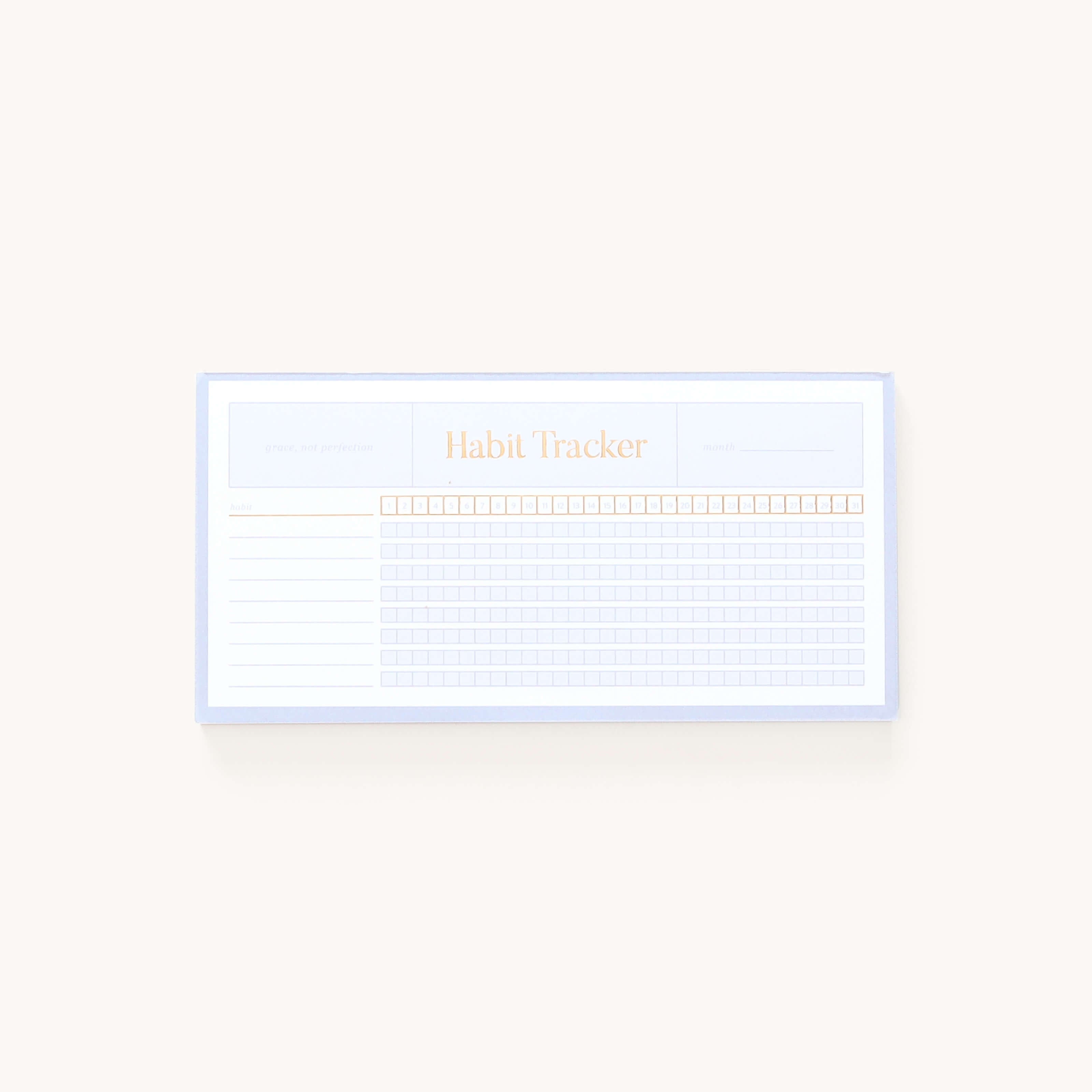 The Simplified Notepad - Habit Tracker features a grid layout with columns for days and rows for habits. Its minimalistic soft-hued design supports habit tracking, grocery lists, or reminders, blending practicality with elegance.