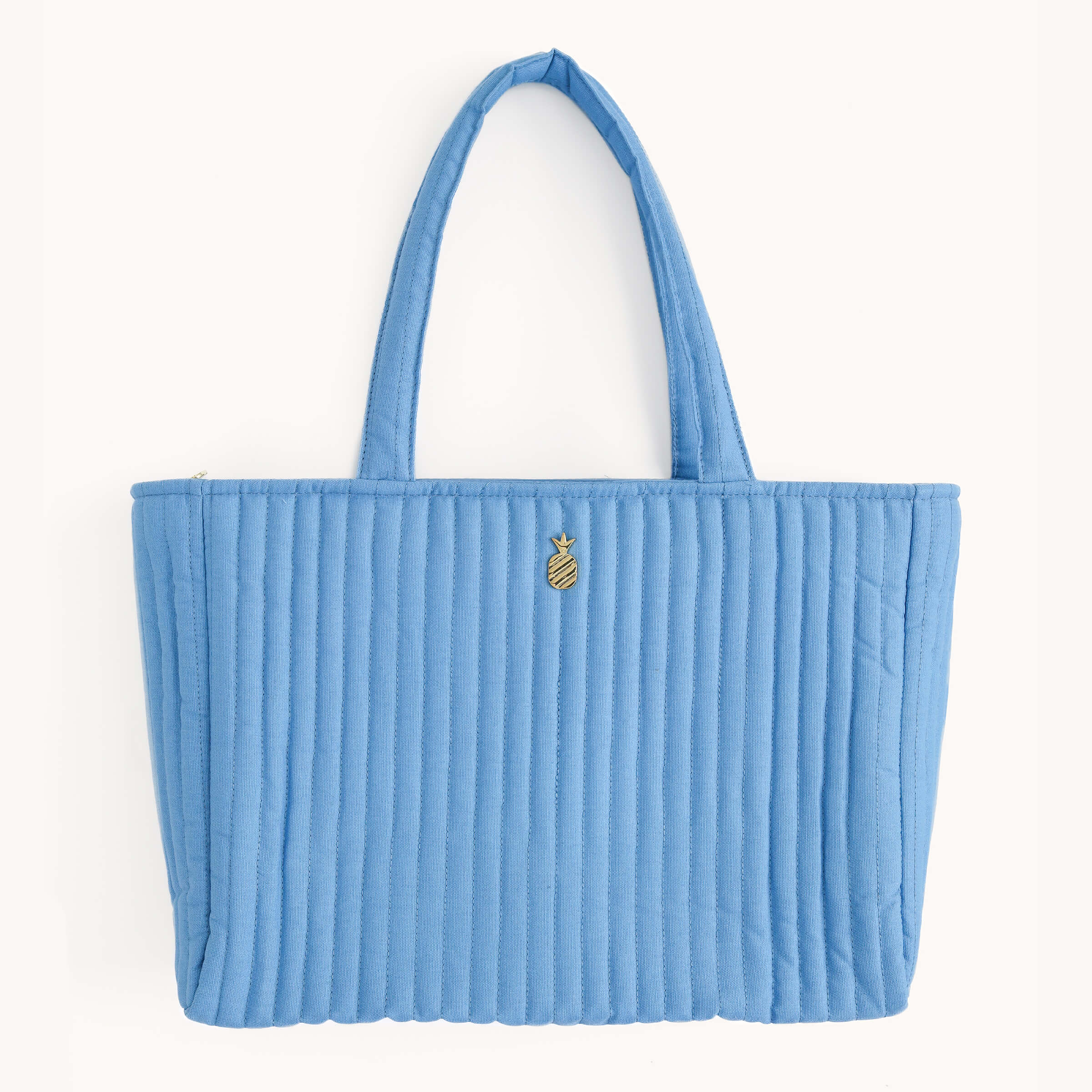 Simplified by Emily Ley | Quilted Tote Bag in French Blue, featuring a soft cotton exterior with a signature fold pineapple embellishment.