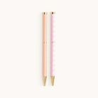 Simplified by Emily Ley | Twist Pen Set featuring two metal pens in Cabana Pinstripe and Blush Block designs. Each pen has a gold twist mechanism. 