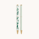 Simplified by Emily Ley | Twist Pen Set featuring two metal pens in Savannah Blooms and Pistachio Plaid designs. Each pen has a gold twist mechanism. 