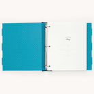 Simplifieds Big Kid Book - Teal binder features a teal polka dot design inside. It includes a title page with spaces for name, date, and contact info on the right. Equipped with metal rings, its perfect for capturing memorable child growth moments.