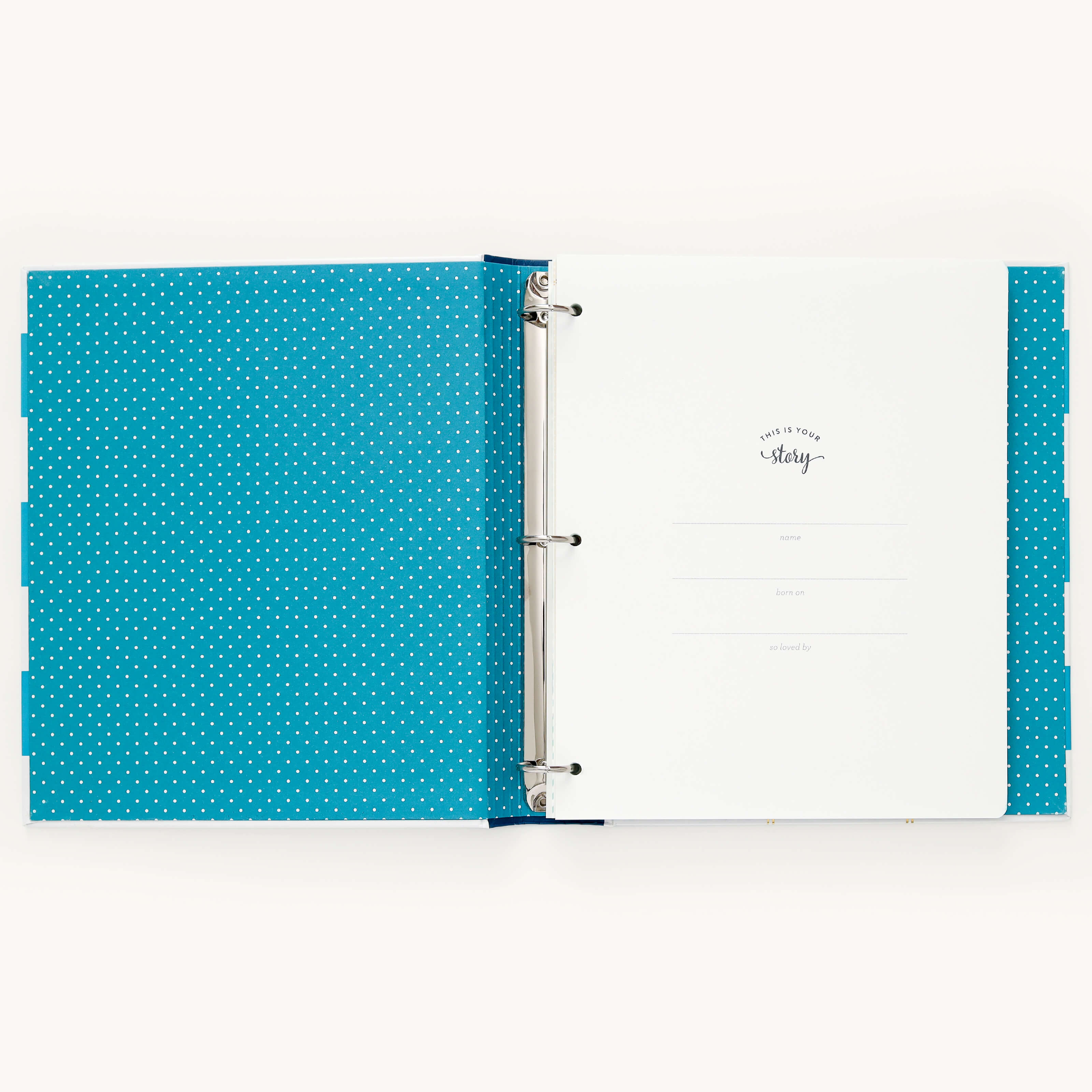 Simplifieds Big Kid Book - Teal binder features a teal polka dot design inside. It includes a title page with spaces for name, date, and contact info on the right. Equipped with metal rings, its perfect for capturing memorable child growth moments.