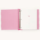 The Big Kid Book - Raspberry by Simplified is a pink ring binder with white polka dots inside, featuring colorful pages for a childs adventures. Sections like Whats Your Story, Name, Date, and Authored by guide the journey.