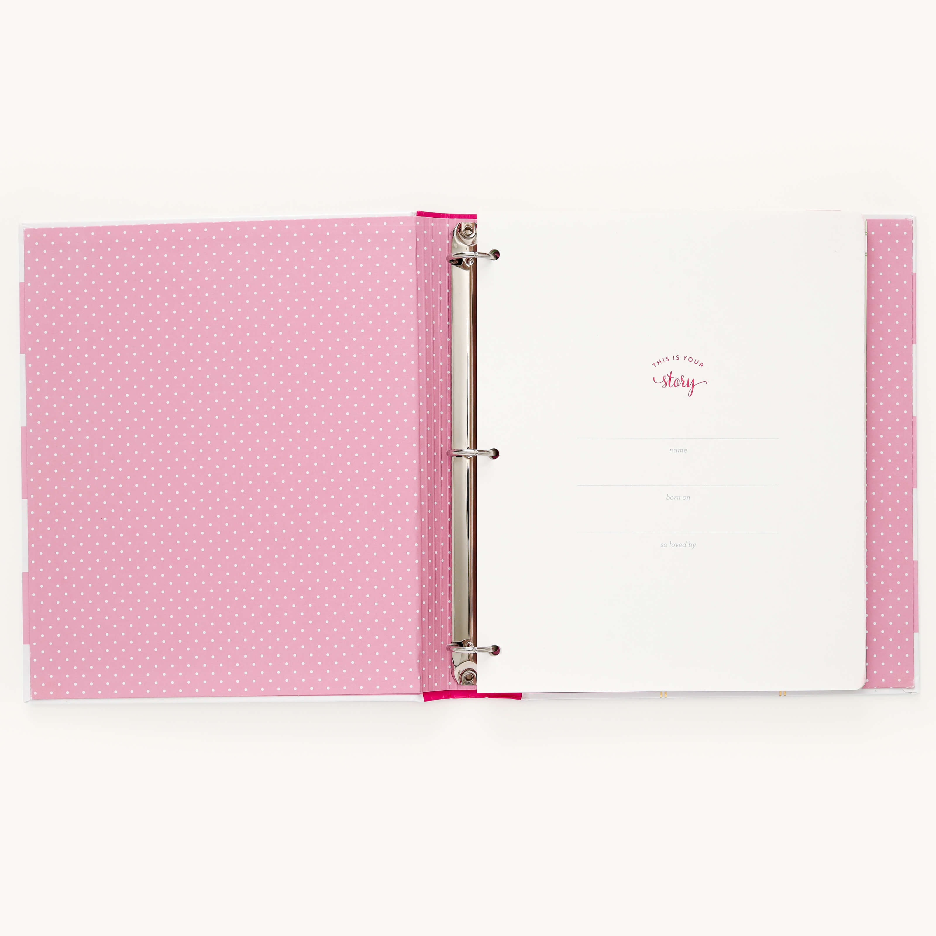 The Big Kid Book - Raspberry by Simplified is a pink ring binder with white polka dots inside, featuring colorful pages for a childs adventures. Sections like Whats Your Story, Name, Date, and Authored by guide the journey.