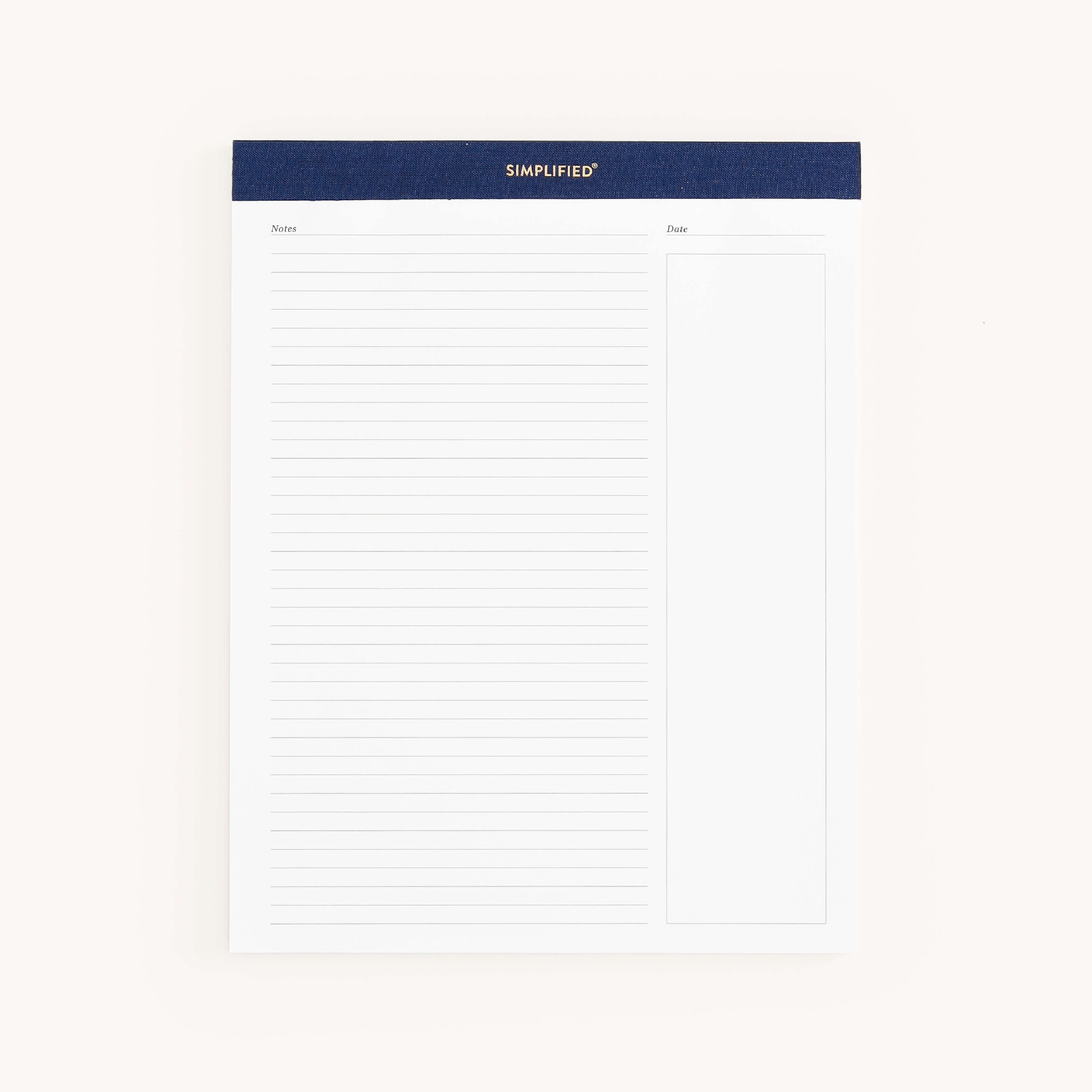 The Legal Pad Set - Navy & Carolina by Simplified includes a premium notepad with a navy header labeled SIMPLIFIED. The left side has lined note space, while the right is blank. Notes and Date are printed in gold foil on a light background for an elegant touch.