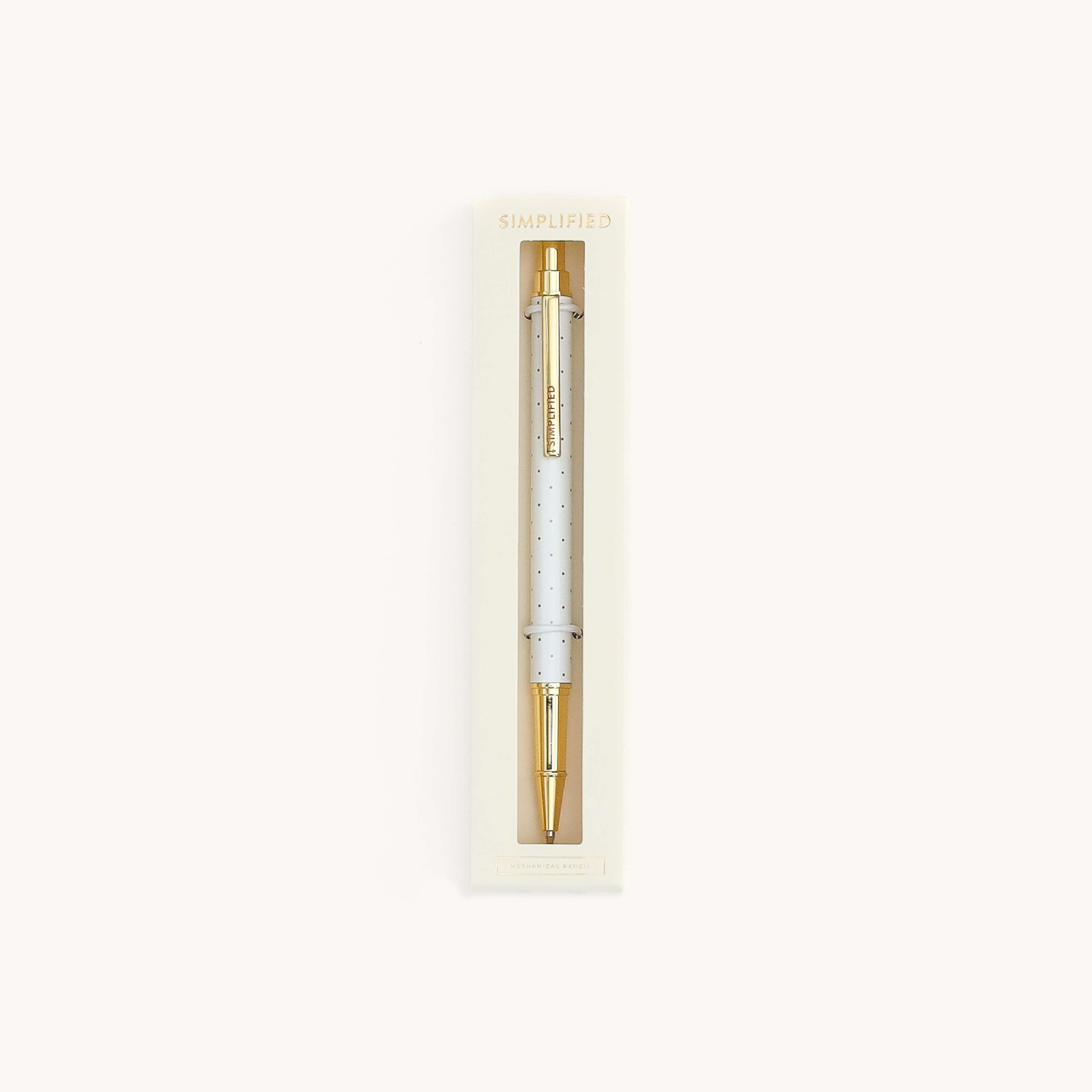 Simplified by Emily Ley | Mechanical Pencil in Gold Dot design nested in ivory box with clear view window. 