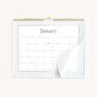 2025 Horizontal Wall Calendar by Emily Ley featuring the Carolina pinstripe open to a month spread 