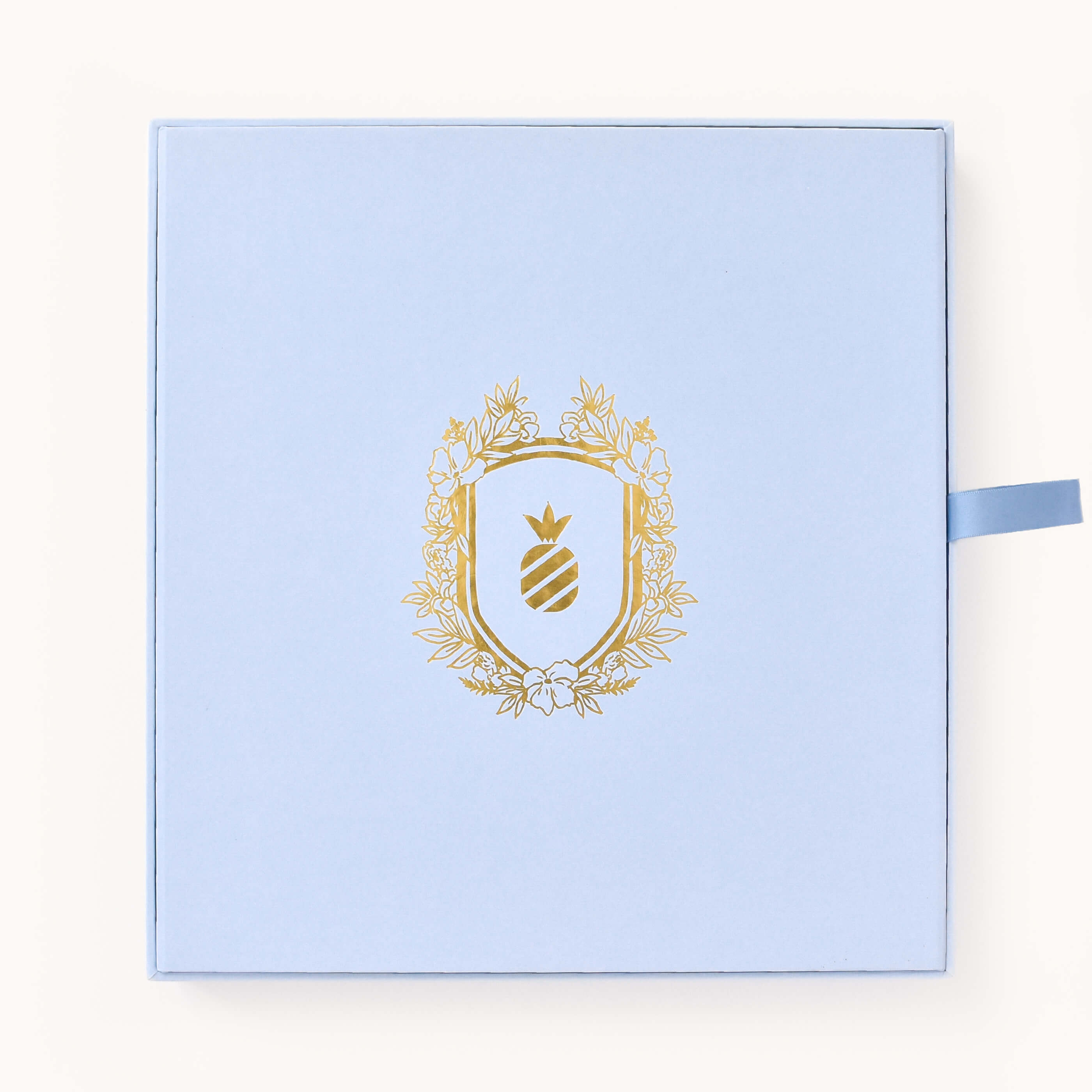 Carolina blue keepsake box with gold foil details for the Simplified Wedding Planner by Emily Ley