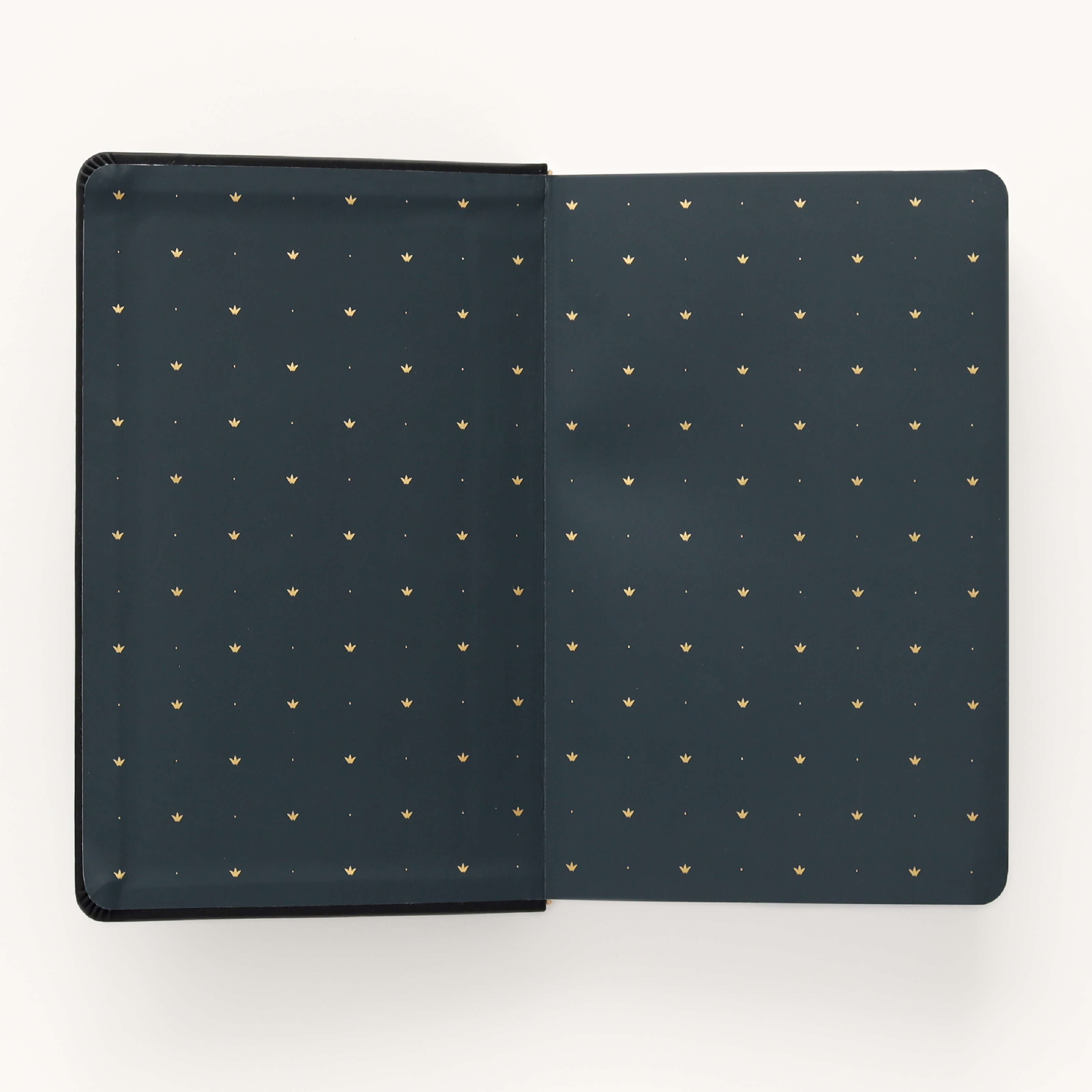 Inside cover of the 2025 Daily Dapperdesk Planner in the Black Tie leatherette cover showcasing the black liner with gold foil detail.