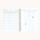 The Simplified Workbook - Finances is a minimalistic, spiral-bound notebook ideal for tracking your financial journey. The left page details goals and dates, while the right includes a savings tracker and bar chart to monitor progress.