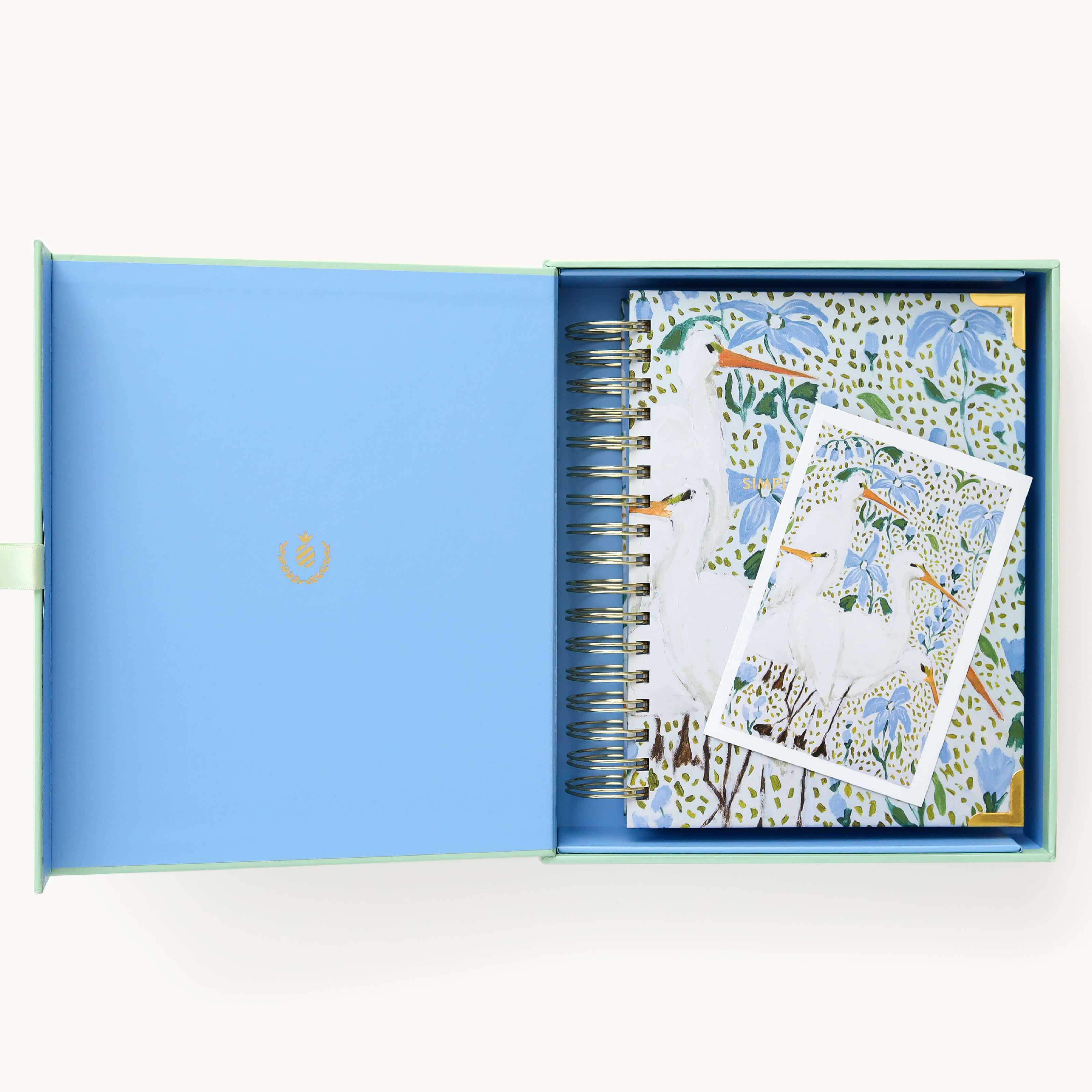 2024-2025 Academic Year Daily Simplified Planner by Emily Ley in the Beaufort Birdies cover design, placed inside a light blue and green keepsake box with gold foil detailing. Includes a matching art print for added inspiration. Perfect for organization, time management, and productivity. 