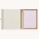 2024-2025 Academic Year Daily Simplified Planner by Emily Ley in the Blush Block cover design, placed inside a light blue and green keepsake box with gold foil detailing. Includes a matching art print for added inspiration. Perfect for organization, time management, and productivity. 