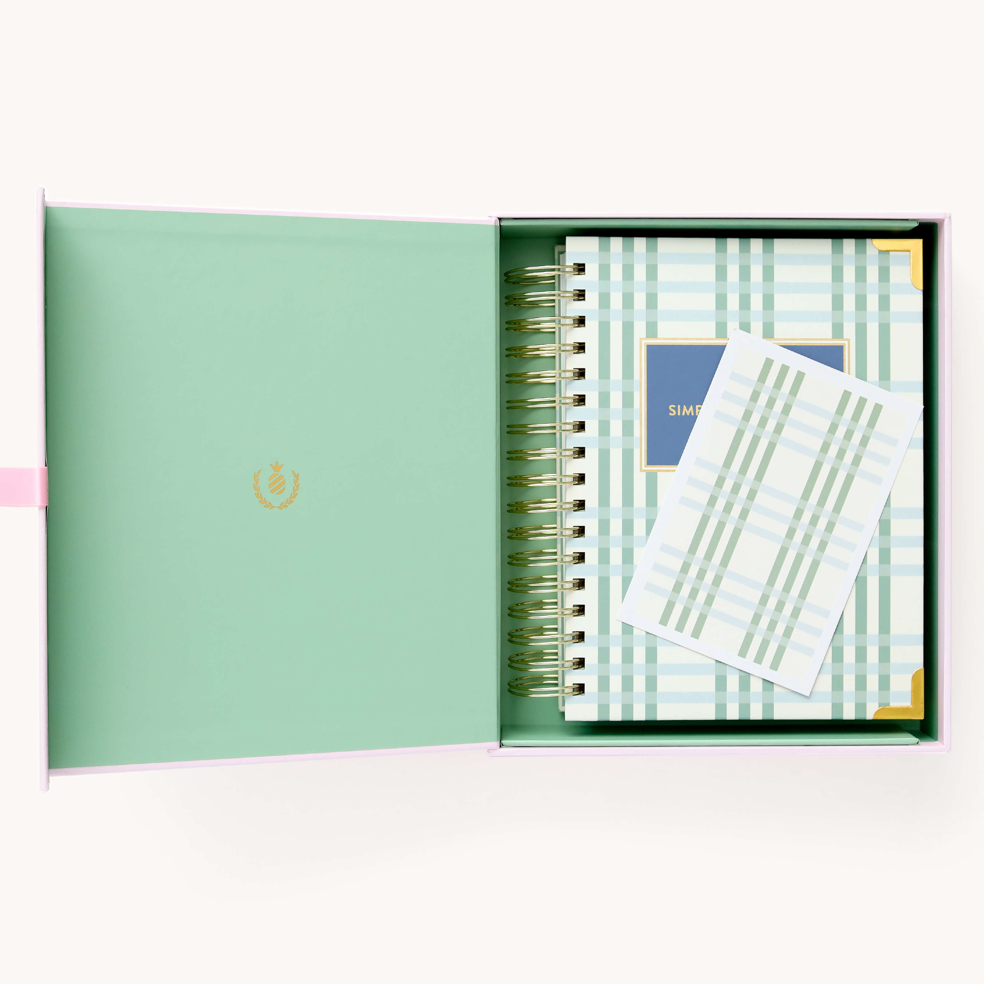 2024-2025 Academic Year Daily Simplified Planner by Emily Ley in the Pistachio Plaid cover design, placed inside a light blue and green keepsake box with gold foil detailing. Includes a matching art print for added inspiration. Perfect for organization, time management, and productivity. 