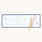 Simplified by Emily Ley | Twist Pen Set featuring two metal pens in Cabana Pinstripe and Blush Block designs used alongside the Weekly Keyboard notepad.