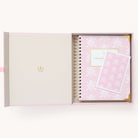 2025 Calendar Year Weekly Simplified Planner by Emily Ley in the Blush Block cover design, placed inside a blush pink keepsake box with gold foil detailing. Includes a matching art print for added inspiration. Perfect for organization, time management, and productivity. 