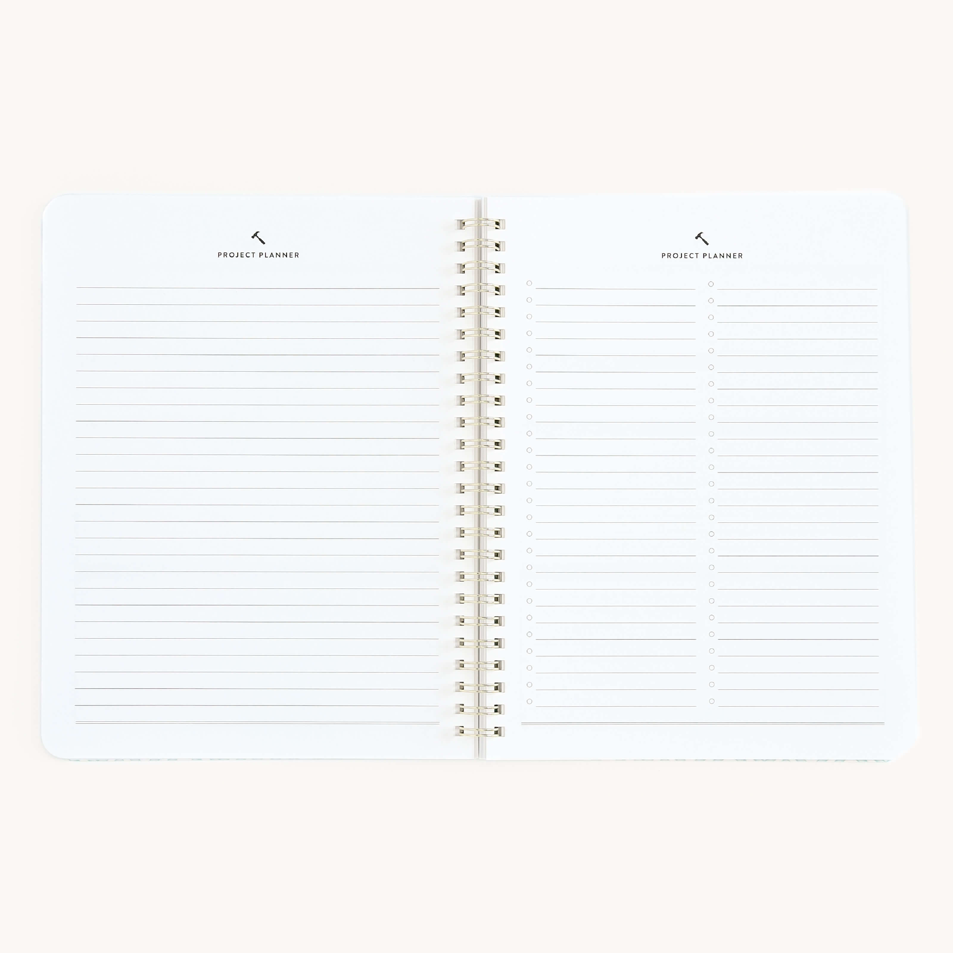 The Simplified Workbook - Project Management is the ideal planning tool, featuring visible pages; the left page provides lined writing space, and the right page includes lines with checkboxes for tasks. The background is plain white.