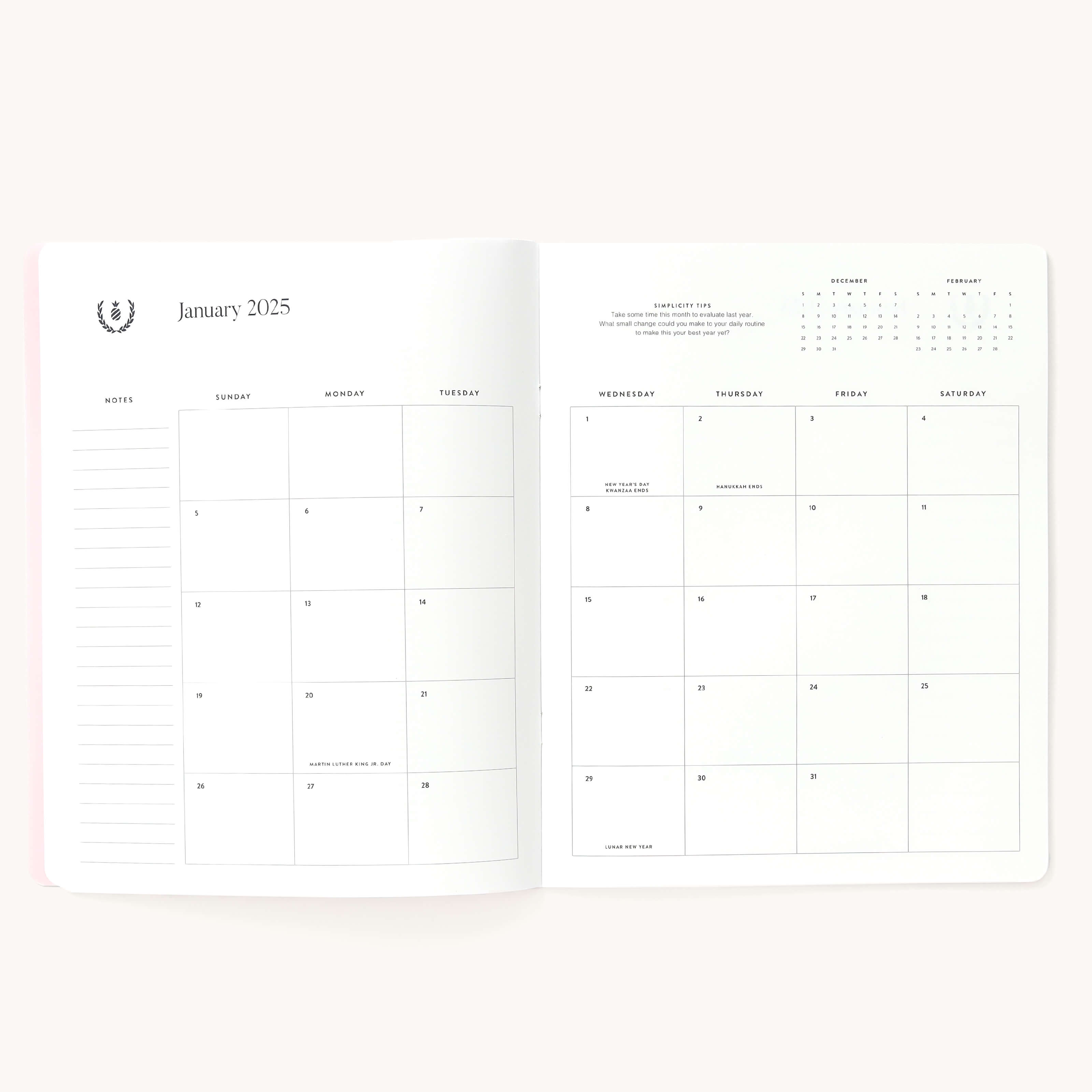 Monthly spread in the 2025 Monthly Planner in the Happy Stripe cover.