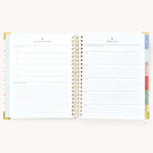 Simplified Planner by Emily Ley open to the Family Mission Statement and Personal Goals pages. The left page provides structured sections for defining core values and crafting a mission statement, while the right page offers dedicated space for setting and tracking personal goals.