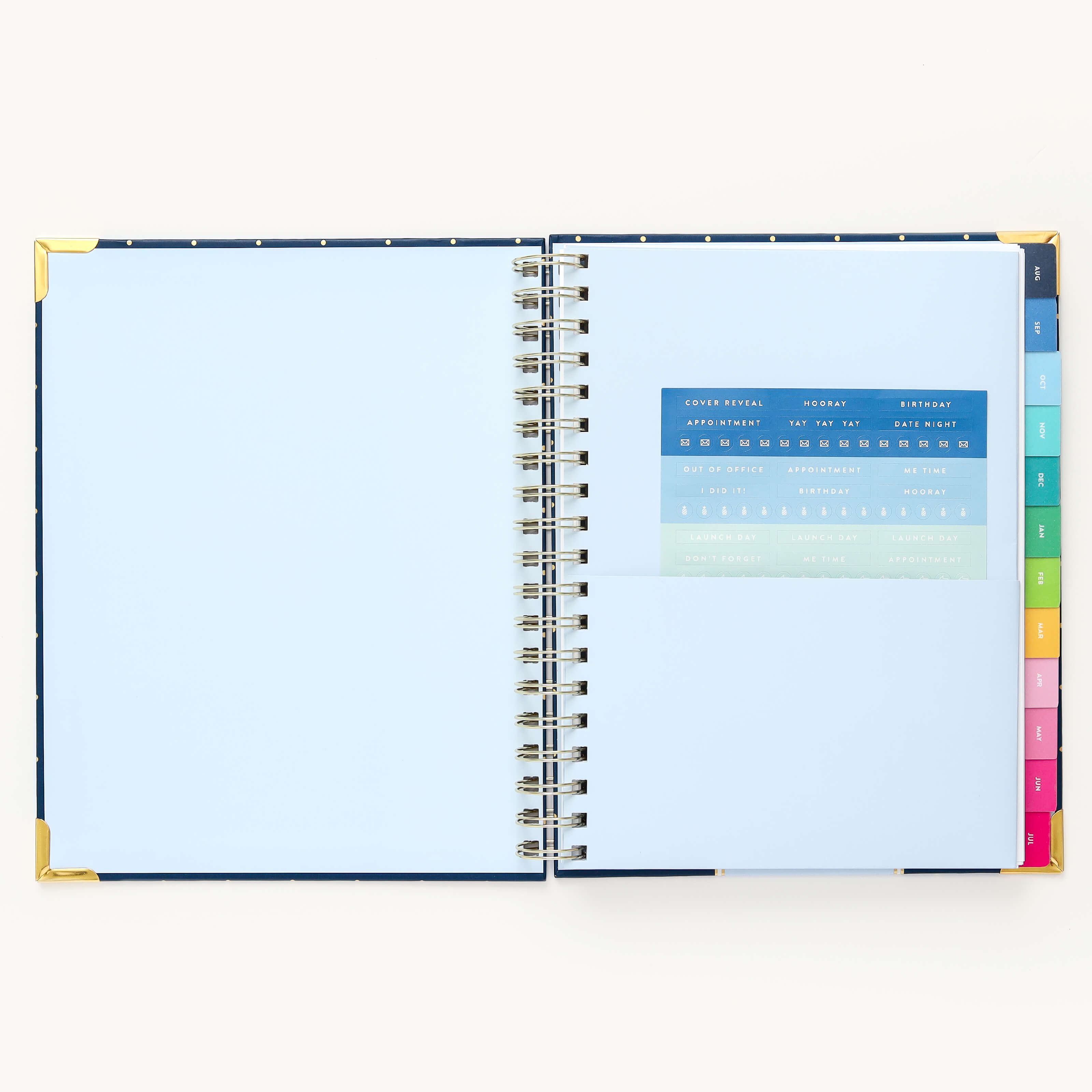 Colorful sticker sheet included in the inner pocket with the 2024-2025 Academic Year Weekly Simplified Planner by Emily Ley in the Dainty Dot cover design for customization. 