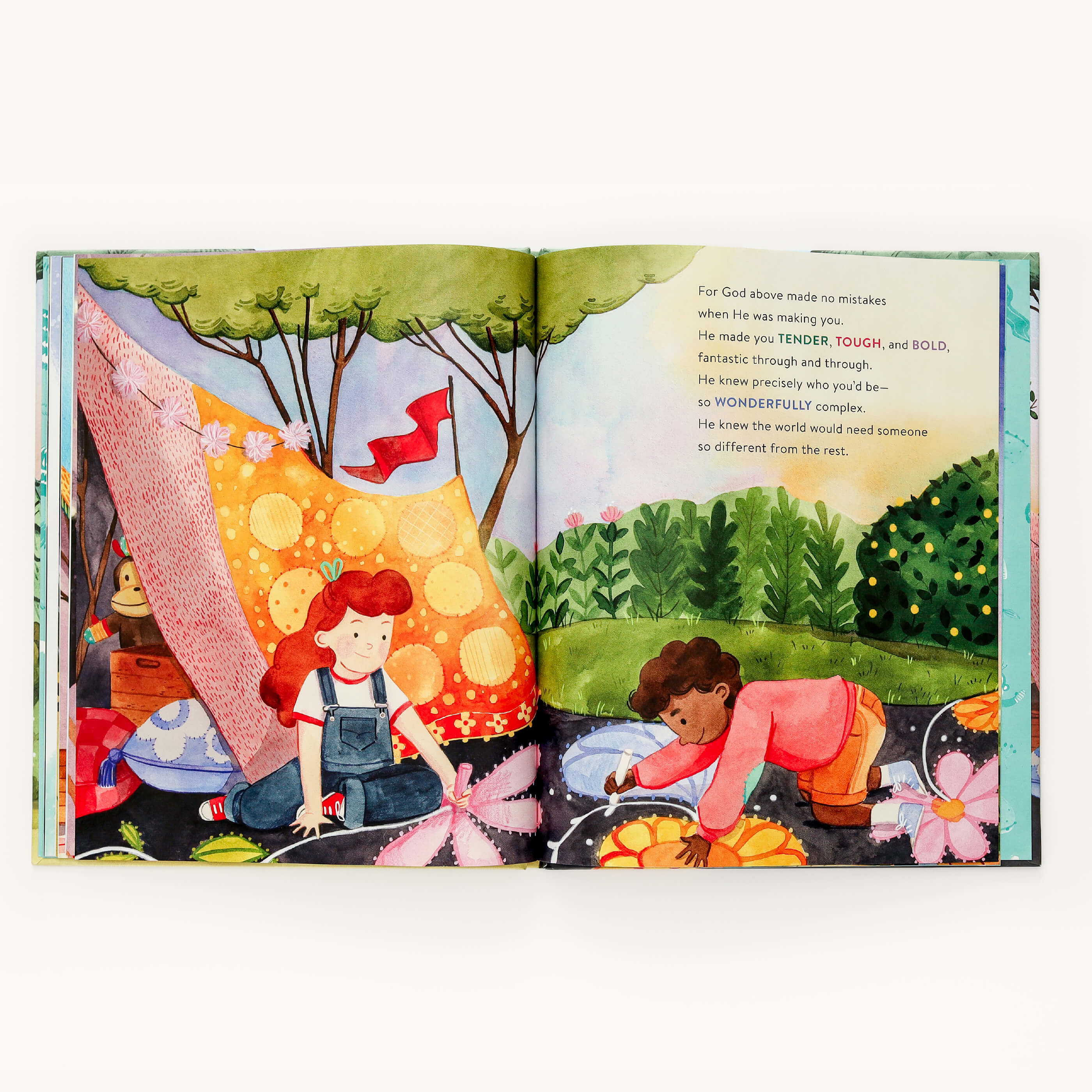 In this illustration from Youre Always Enough by Emily Ley, a red-haired child in overalls waters plants and a short-haired child in a pink shirt plants flowers, showcasing individuality. A colorful tent enhances the nurturing scene. Brand: Simplified.