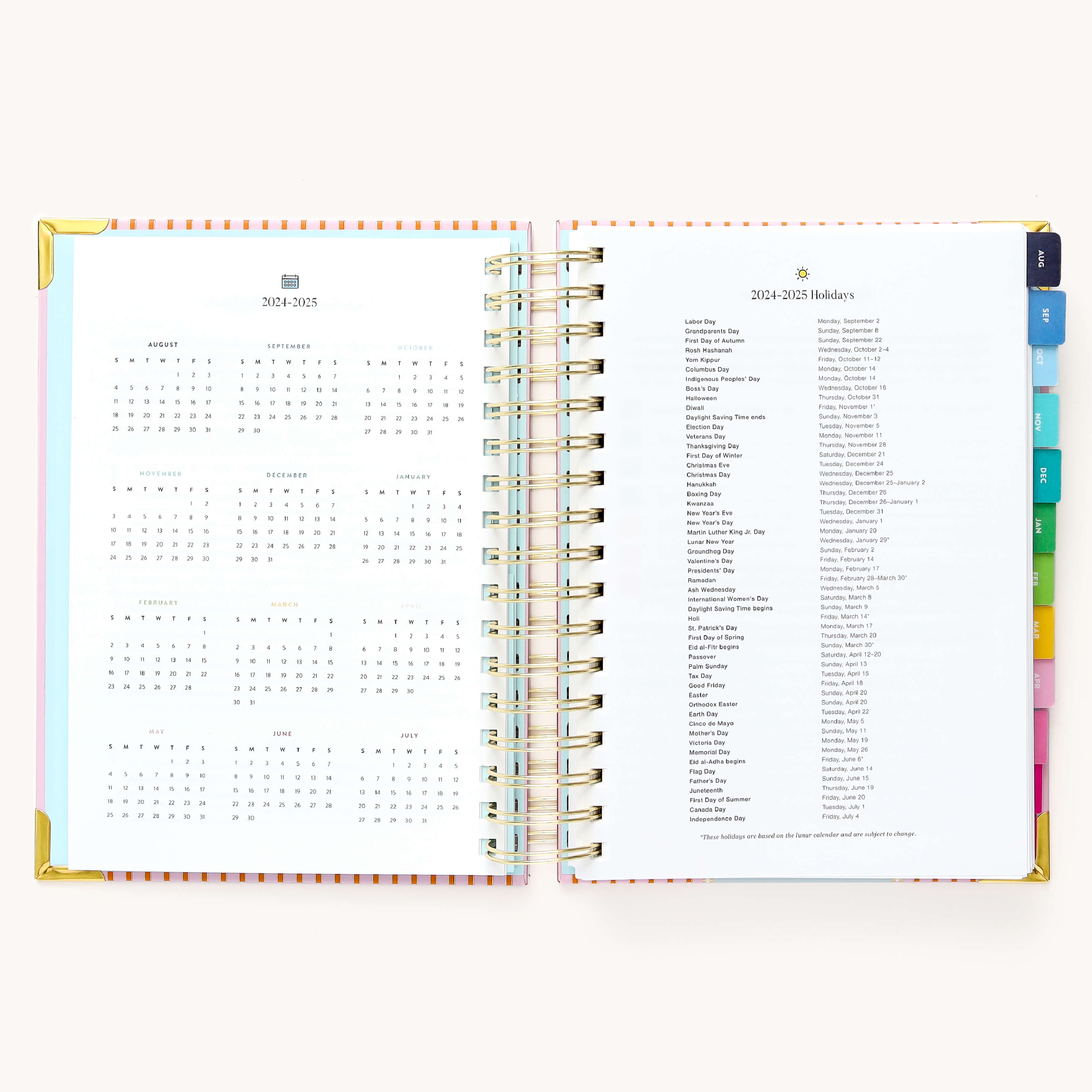 2024-2025 Daily Simplified Planner by Emily Ley in the Cabana Pinstripe cover design open to the yearly calendar overview and holidays list. Features a two-page spread with a full 12-month calendar view on the left and important U.S. holidays on the right. 