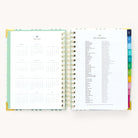 2024-2025 Daily Simplified Planner by Emily Ley in the Pistachio Plaid cover design open to the yearly calendar overview and holidays list. Features a two-page spread with a full 12-month calendar view on the left and important U.S. holidays on the right. 