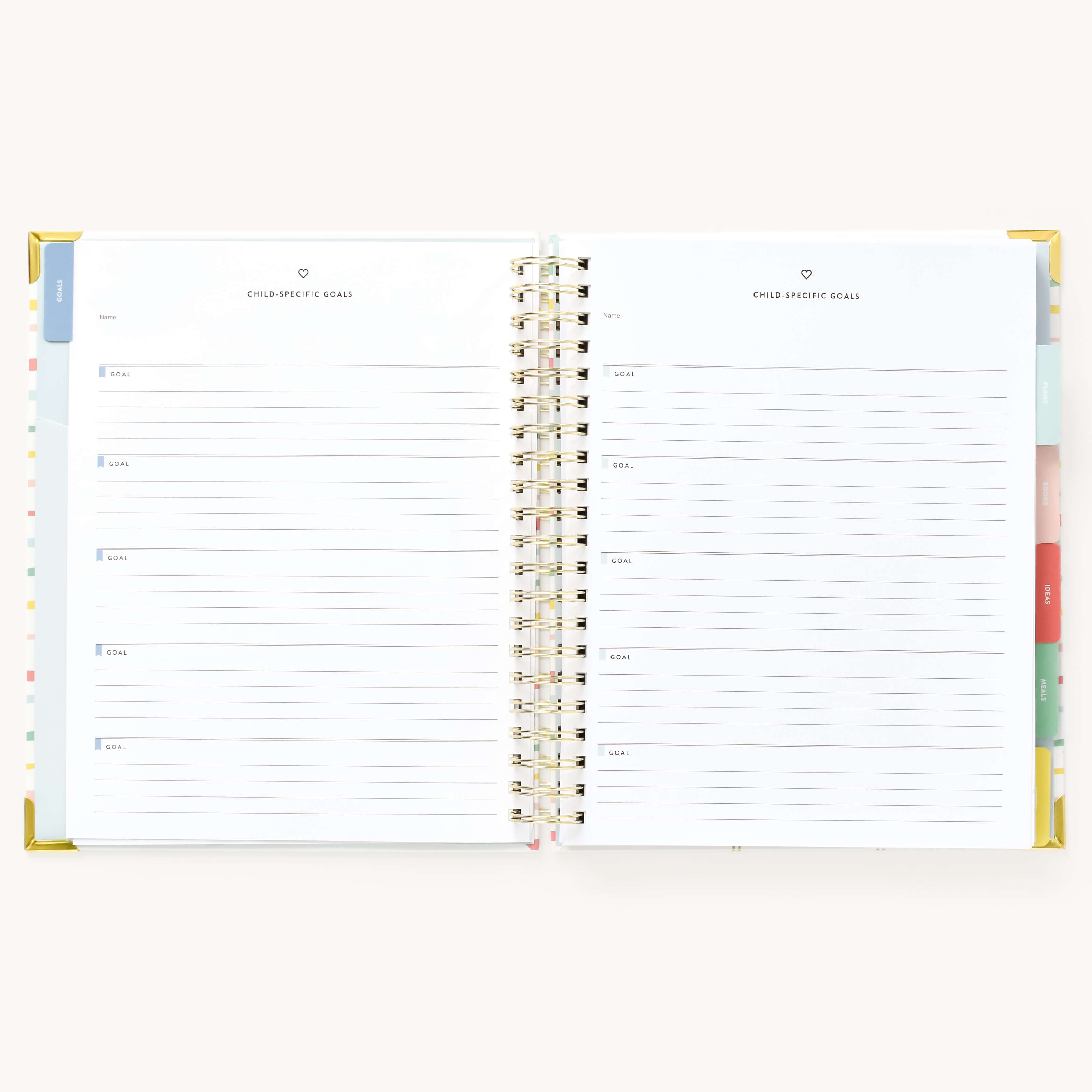 Simplified Planner by Emily Ley open to the Child-Specific Goals pages. Designed for parents to set and track individual goals for each child, with dedicated spaces for multiple goal entries.