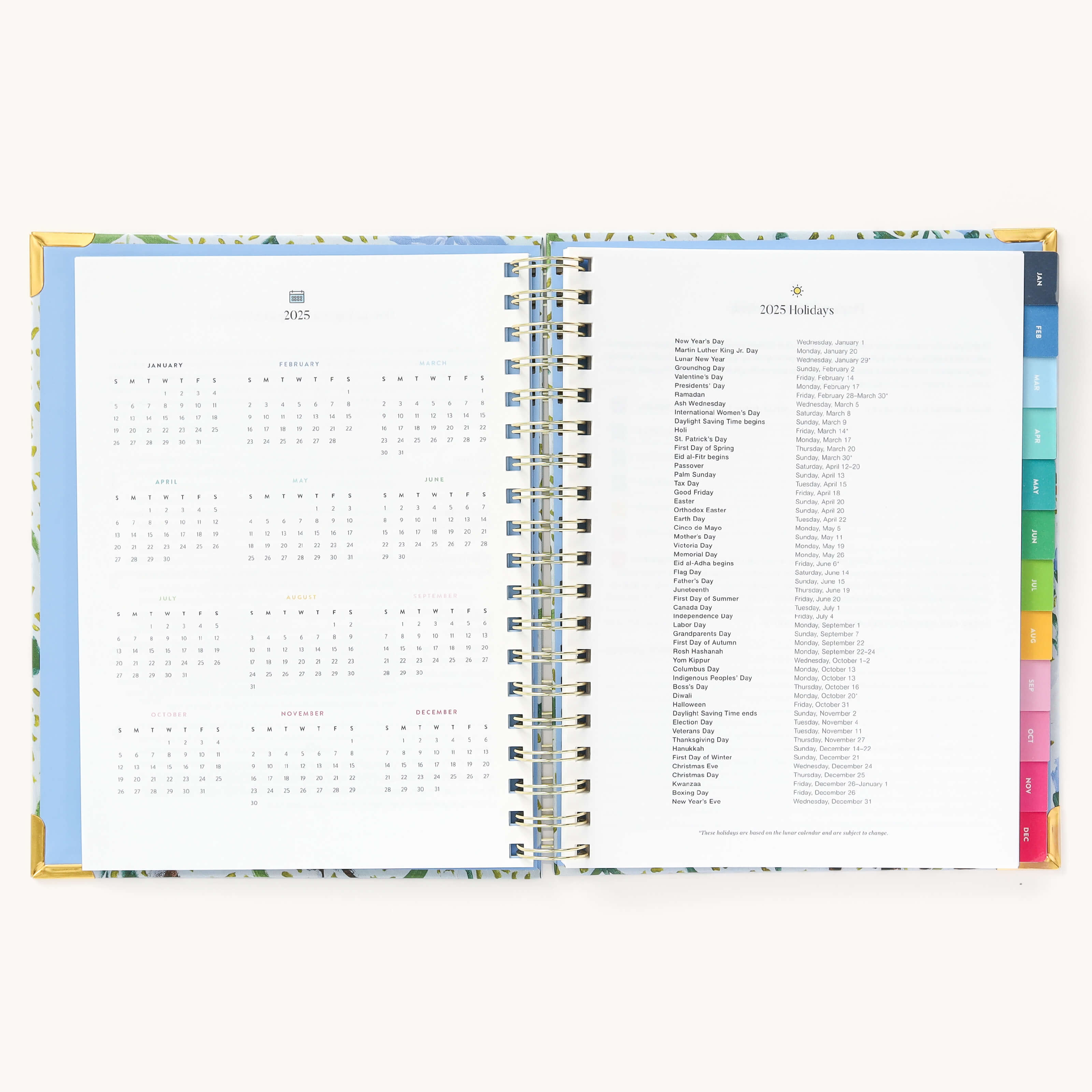 2025 Weekly Simplified Planner by Emily Ley in the Beaufort Birdies cover design open to the yearly calendar overview and holidays list. Features a two-page spread with a full 12-month calendar view on the left and important U.S. holidays on the right. 