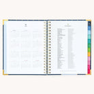 2025 Weekly Simplified Planner by Emily Ley in the Dainty Dot cover design open to the yearly calendar overview and holidays list. Features a two-page spread with a full 12-month calendar view on the left and important U.S. holidays on the right. 