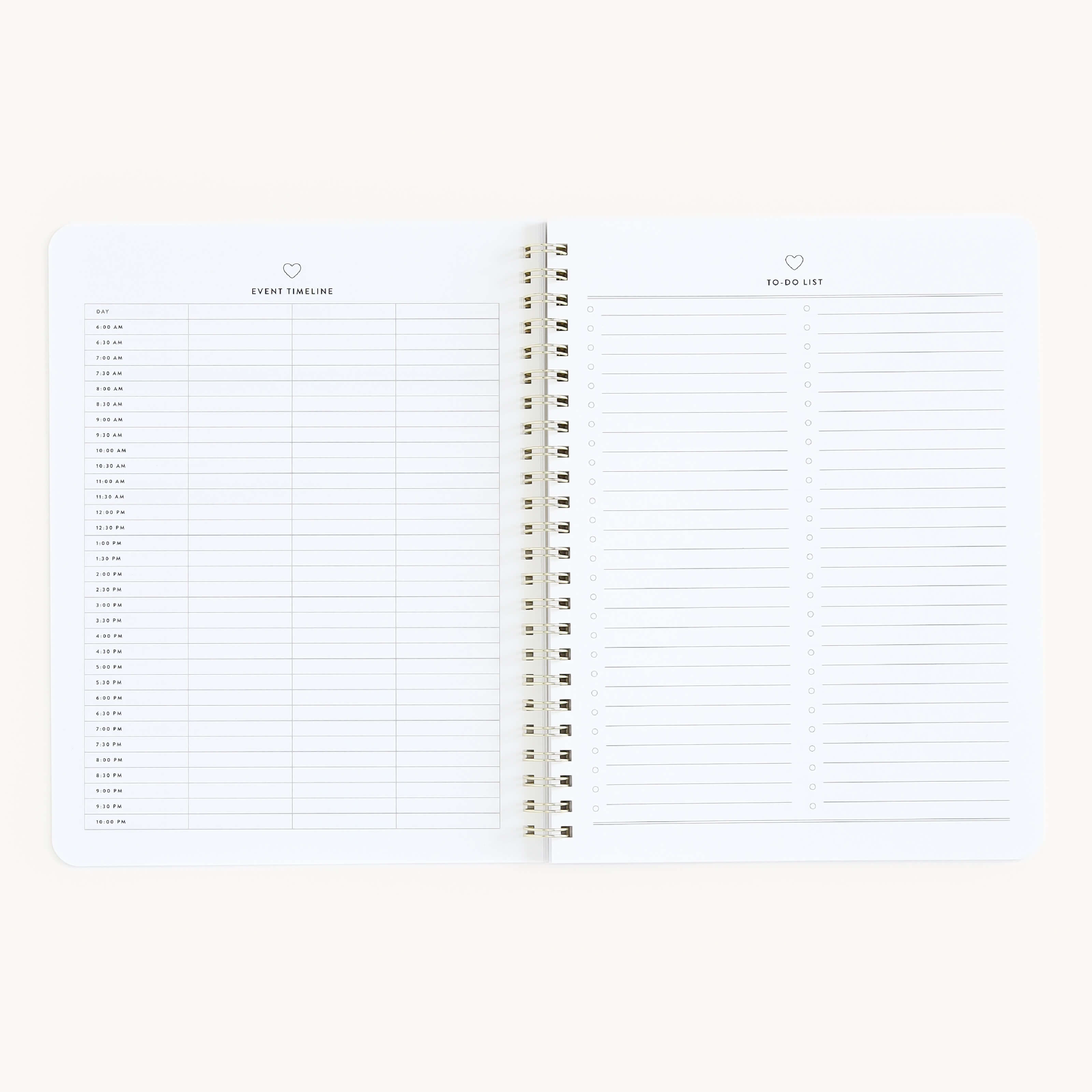 The Simplified Workbook - Hosting shows two pages: an Event Timeline with slots from 6 a.m. to 8 p.m. for planning gatherings on the left and a To-Do List for task organization on the right, both topped with simple heart icons.