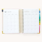 Monthly calendar spread in the 2024-2025 Daily Simplified Planner by Emily Ley in the Blush Block cover design featuring a clean, minimalistic layout with space for goal setting, appointments, and important dates.