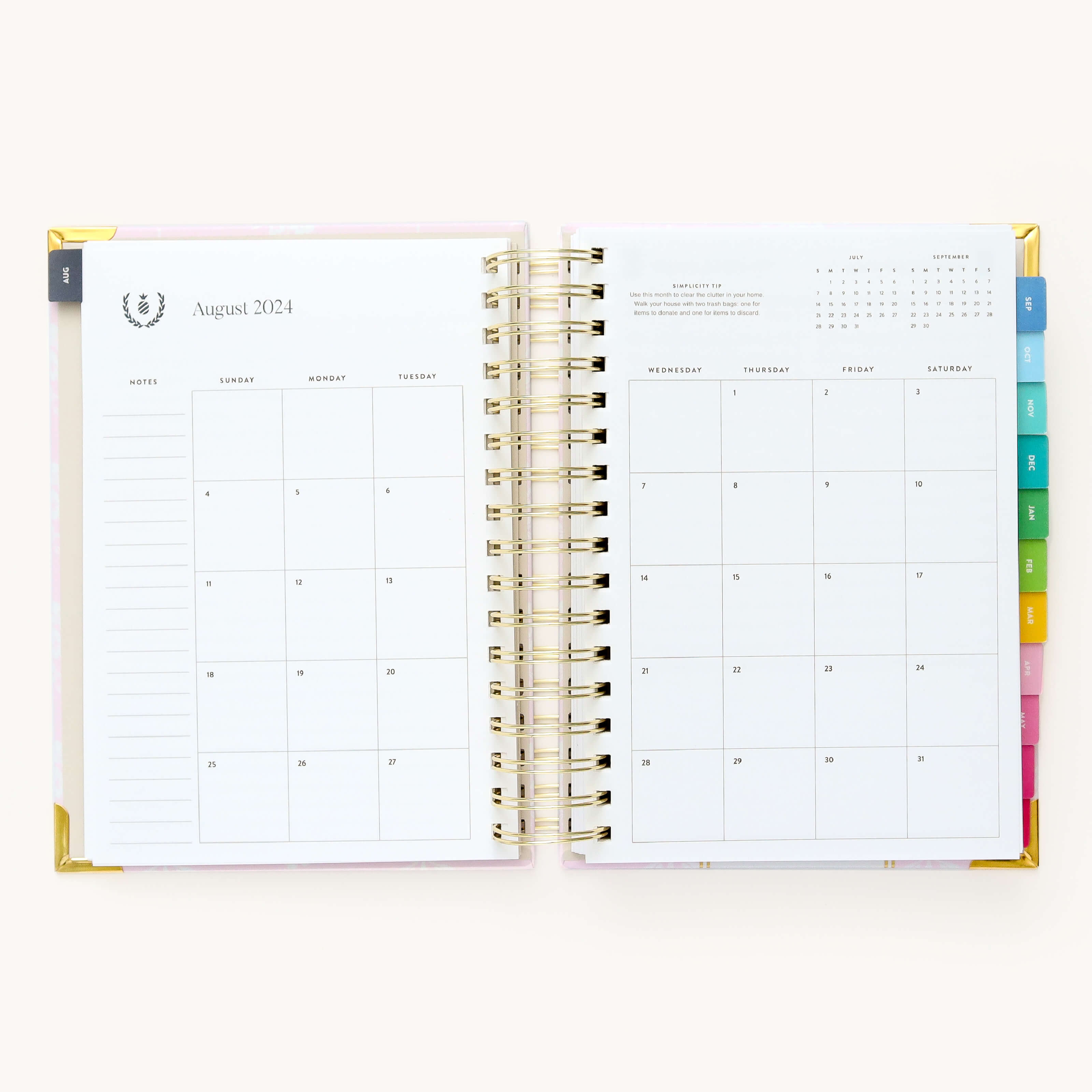 Monthly calendar spread in the 2024-2025 Daily Simplified Planner by Emily Ley in the Blush Block cover design featuring a clean, minimalistic layout with space for goal setting, appointments, and important dates.