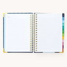 2024-2025 Daily Simplified Planner in the Dainty Dot cover design open to the notes pages at the front of the planner. Features a two-page spread with blank lined notes pages. 