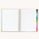 2025 Weekly Simplified Planner in the Cabana Pinstripe cover design open to the notes pages at the front of the planner. Features a two-page spread with blank lined notes pages. 