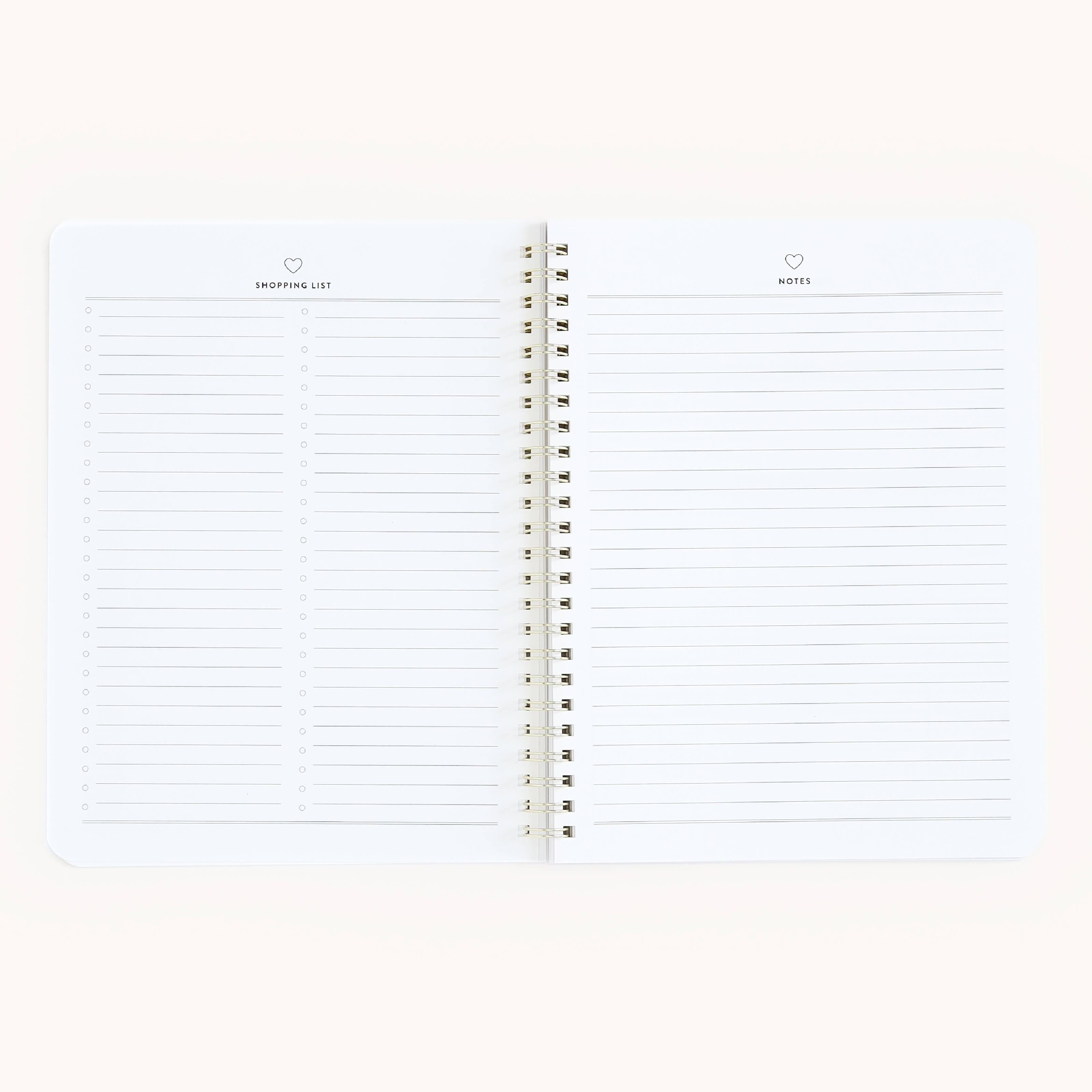 Simplifieds Workbook - Hosting is an open spiral notebook with a cream background. The left page, titled Shopping List, includes checkboxes and lines for party supplies, while the right page labeled Notes provides space to plan memorable gatherings.