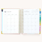 Monthly calendar spread in the 2024-2025 Daily Simplified Planner by Emily Ley in the Cabana Pinstripe cover design featuring a clean, minimalistic layout with space for goal setting, appointments, and important dates.