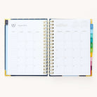 Monthly calendar spread in the 2024-2025 Daily Simplified Planner by Emily Ley in the Dainty Dot cover design featuring a clean, minimalistic layout with space for goal setting, appointments, and important dates.