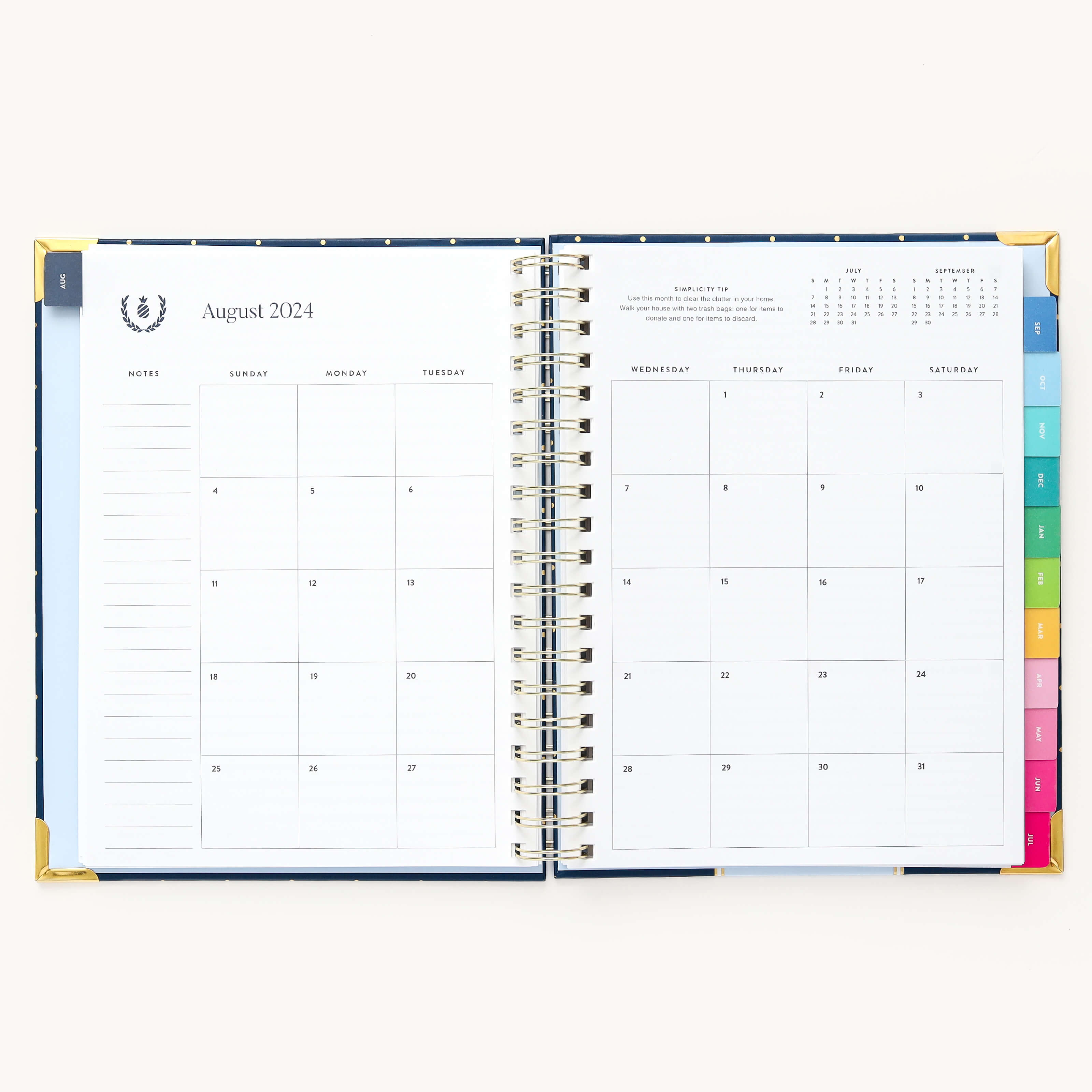 Monthly calendar spread in the 2024-2025 Weekly Simplified Planner by Emily Ley in the Dainty Dot cover design featuring a clean, minimalistic layout with space for goal setting, appointments, and important dates.