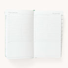 2024-2025 Daily Dapperdesk Planner by Emily Ley in the Sea Salt leatherette cover open to a two-page daily spread featuring Thursday and Friday. Features a clean, minimalistic design with lined sections for daily tasks, to-do lists, and notes.